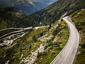 Aerial view of winding road through beautiful alpine landscape and valleys,Oberwald,Switzerland