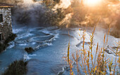 Aerial view of tranquil thermal springs at sunrise with mist,Terme di Saturnia,Tuscany,Italy