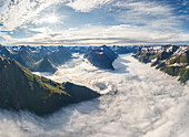Aerial view of mountain chain above the clouds,Norway
