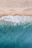 Aerial View Of Tropical Ocean Waves Breaking On Empty Copacabana Beach,Rio De Janeiro,Brazil