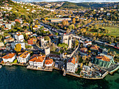 Aerial view of the historic anatolian fortress and scenic coastline along the bosphorus with greenery and urban buildings,Anadolu Hisari,Turkey