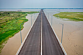 Aerial view of Padma bridge,over the padma river by day in perspective,Shibchar,Dhaka,Bangladesh