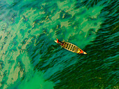 Badalgachhi,Bangladesh - 30 January 2021: Aerial view of fishermen on a canoe sailing the Jamuna river,Bangladesh