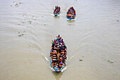 Narayanganj,Bangladesh - 19 July 2021: Aerial view of cattle squeezed on a boat crossing the river in Narayanganj,Bangladesh