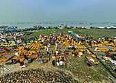 Dhaka,Bangladesh - 24 January 2023: Aerial view of people working in a local food market
