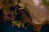 Aerial view of a fishing boat docked along the Kaliganga river,Dhaka,Bangladesh