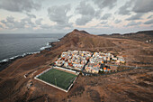 Panoramic aerial view of a soccer pitch and a little town,Las Coloradas,Gran Canaria,Spain