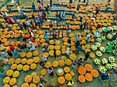 Dhaka,Bangladesh - 24 January 2023: Aerial view of people working in a local food market