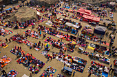 Aerial view of people working and trading at Rahman market along Karnaphuli river,Chittagong,Bangladesh
