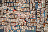 Aerial view of Women at work on the preparation of natural fabric,Barga,Rajshahi,Bangladesh