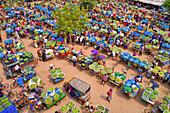 Shibganj,Bangladesh - 14 June 2019: Aerial view of a few people working at Kansat mango Bazar,the largest mango market in the world,Shibganj province,Bangladesh