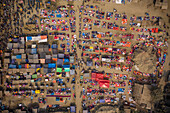 Aerial view of people working and trading at Rahman market along Karnaphuli river,Chittagong,Bangladesh