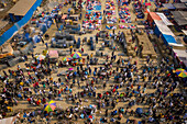 Chittagong,Bangladesh - 05 January 2021: Aerial view of people working and trading at Rahman market along Karnaphuli river,Chittagong,Bangladesh
