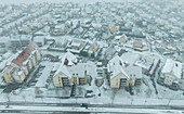 Aerial view of falling snow in the residential area Kingersheim,Mulhouse,Alsace,France