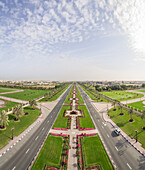 Aerial view of long road and flower beds in University City,Sharjah,UAE