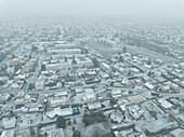 Aerial view of falling snow in the residential area Kingersheim,Mulhouse,Alsace,France