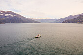 Aerial view of single ferry boat crossing Lago di Como,Cadenabbia,Italy