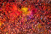 Nandgaon,India - 01 March 2023: Aerial view of people celebrating the holy colour festival at Shri And Baba Temple,Uttar Pradesh,India
