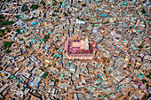 Aerial view of people celebrating the holy colour festival near the Shri And Baba Temple,Uttar Pradesh,India