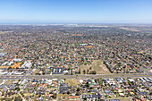 Aerial view of suburban neighborhood with spacious homes and infrastructure,Sydenham,Australia