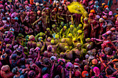 Nandgaon,India - 01 March 2023: Aerial view of people celebrating the holy colour festival at Shri And Baba Temple,Uttar Pradesh,India
