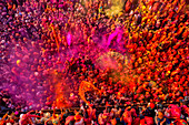 Nandgaon,India - 01 March 2023: Aerial view of people celebrating the holy colour festival at Shri And Baba Temple,Uttar Pradesh,India