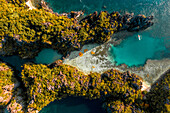 Aerial view of kayaks attached together in pattern in bay of El Nido,the Philippines