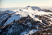 Aerial view of snowy Mount Buller ski resort with beautiful alpine landscape,Victoria,Australia