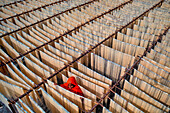 Barga,Bangladesh - 17 April 2022: Aerial view of People working on the production of typical natural fabric,Rajshahi