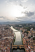 Panoramic aerial view of the Arno river crossing Florence old town,Tuscany,Italy