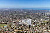Aerial view of urban suburb with residential homes and commercial areas,Hoppers Crossing,Australia