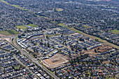 Aerial view of suburban development with modern homes and infrastructure,Cranbourne South,Australia