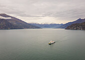 Aerial view of single ferry boat crossing Lago di Como,Cadenabbia,Italy