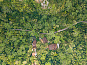 Aerial view of Indonesian Jungle with Huts,Kabupaten Purworejo,Jawa Tengah,Indonesia