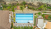 Aerial view of woman lying by swimming pool,Tagbilaran,Philippines