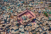 Aerial view of people celebrating the holy colour festival near the Shri And Baba Temple,Uttar Pradesh,India