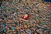 Aerial view of people celebrating the holy colour festival near the Shri And Baba Temple,Uttar Pradesh,India
