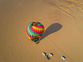 Aerial view of an hot-air-balloon landing in the Murqquab desert in Dubai,U.A.E