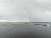Aerial view of Skyway Bridge over Tampa Bay with rainbow,St Petersburg,Florida,United States