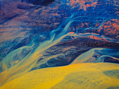 Aerial view of colorful abstract patterns and textures in a vibrant landscape,Hvolsvollur,Islanda