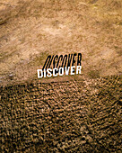 Aerial view of abstract patterned landscape with discover text,Fort Worth,United States