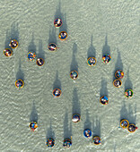 Aerial view of coconut boat tour with tourists in round bamboo boats on beautiful water,Hoi An,Vietnam