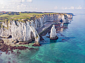 Aerial view of Falaise d'Aval,a soaring chalk cliff with natural arch along the coastline,Seine-Maritime,France