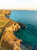 Aerial view of Bedruthan Carnewas Steps beach at sunset,Cornwall,United Kingdom
