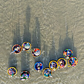 Aerial view of tourists in round bamboo boats on a clear river,Hoi An,Vietnam