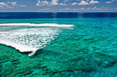 Aerial view of beautiful tropical atoll with turquoise waters and sandy beaches,Maldives