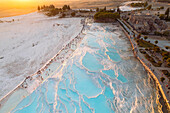 Aerial view of beautiful travertine terraces and thermal pools at sunset,Pamukkale,Turkey