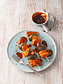 Chicken and vegetable skewers with barbecue sauce