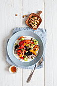 Bowl with buckwheat groats and summer fruit