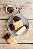 Sandwich ice cream with dark chocolate coating